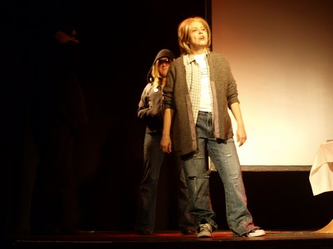 Johanna Householder: <em>The subject of art: Badiou, Cobain</em>, singing, 2010, performance shot, <em>CHAOS</em>; photo Jordan Hutchings; courtesy CHAOS